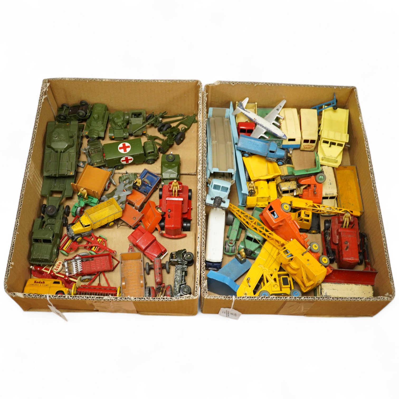Fifty 1950s/60s Dinky Toys, including military vehicles, farm vehicles, aircraft, commercial vehicles, etc. examples include; Pullmore car transporter and ramp, Mighty Antar tank transporter and Centurion tank, Kodak Bed
